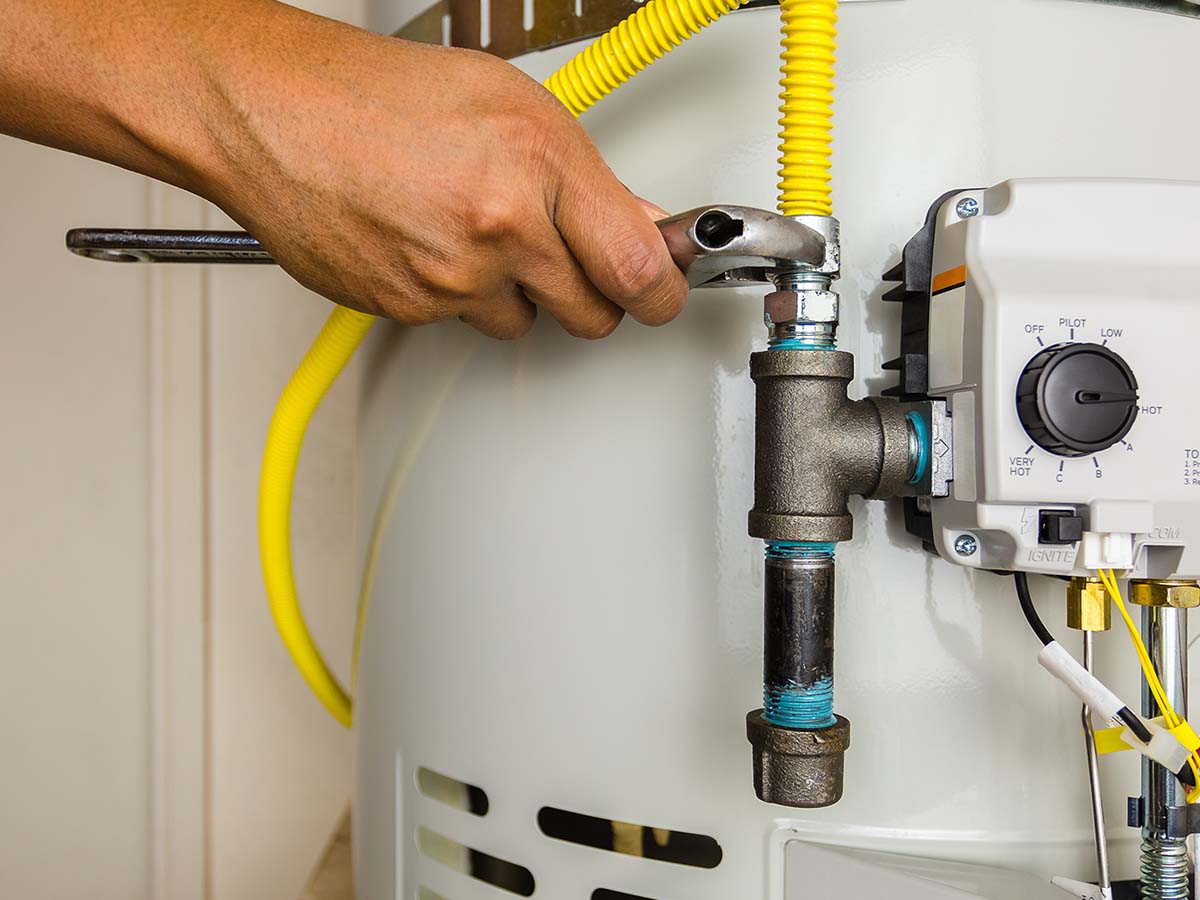 a water heater being fixed